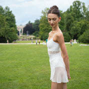 Camisole leotard with thin straps and a scoop neckline that flatters every figure. The lace beltemphasises the waistline by embellishing it 